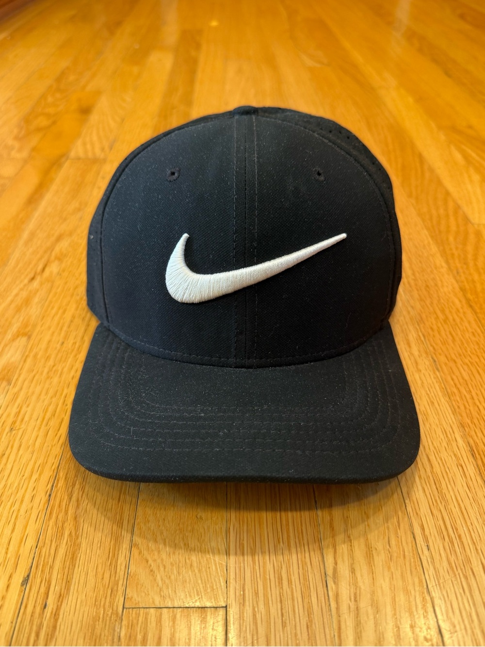 Nike Black Hat with White Swoosh Logo
